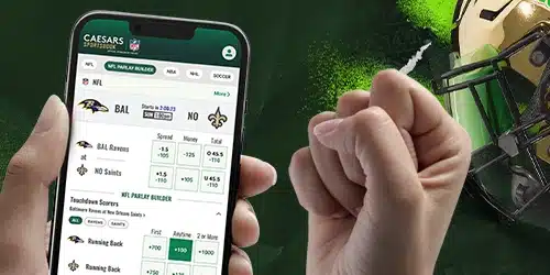 A sports fan celebrating a winning NFL bet made on the Caesars Sportsbook mobile app in North Carolina.